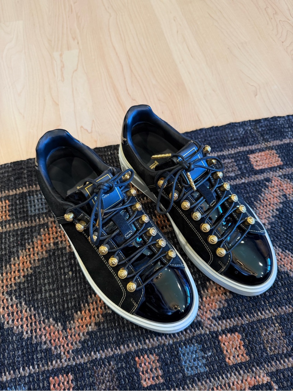 Balmain Black Low-Top Sneakers with Gold Stud Accents